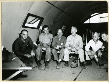 Photograph of Ernie Pyle Interviewing Combat Photographers at Guam