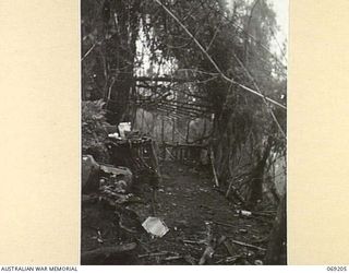 NEW GUINEA. APRIL, 1944. A WRECKED AND DEVASTATED COOKHOUSE ON SHAGGY RIDGE IMMEDIATELY AFTER THE BATTLE