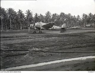MILNE BAY, PAPUA. C. 1942-10. A BEAUFIGHTER AIRCRAFT OF NO. 30 SQUADRON RAAF STARTING ITS TAKE-OFF RUN ON THE MUDDY GURNEY AIRSTRIP