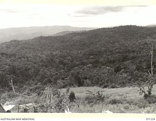 FINSCHHAFEN AREA, NEW GUINEA, 1944-03-17. JIVEVENANG, THE PIMPLE, COCONUT RIDGE, STEEPLE TREE AND FOUGASSE CORNER VIEWED FROM SATTELBERG AT 1400 HOURS