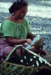 Grating ingredients for vaihu tamoko for fakanoanoa (evening mourning gathering)