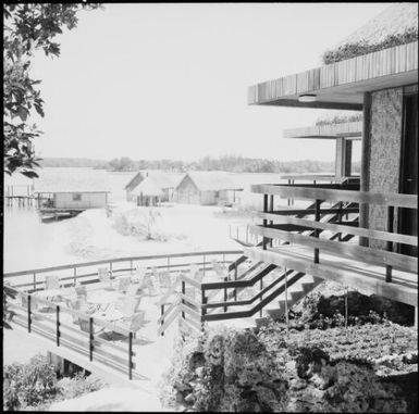 Bure accommodation on the waterfront at Le Lagon Resort, Port Vila, New Hebrides, 1969 / Michael Terry