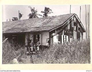 ALEXISHAFEN, NEW GUINEA. 1944-05-15. THE OLD HOSPITAL AT THE CATHOLIC MISSION. IT IS NOW IN USE AS THE MAIN WARD AT THE MAIN DRESSING STATION, 2/15TH FIELD AMBULANCE. MANY OF THE MISSION'S ..