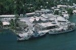 Aerial photo taken of the research ship R/V Argo (in center), while stationed in port in the Pago Pago Harbor. Pago Pago is the capital town of American Samoa. It is actually a village that is often mistaken to be a city (as in a capital or port city) of this south Pacific territory of the United States of America. The village is located on Pago Pago Harbor, in the island of Tutuila. Circa 1967