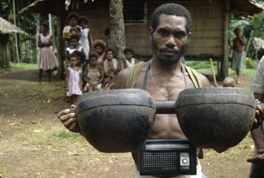 Ben Burt Malaita PhotosPatteson Siudufu with double bowl formerly used by a priest and his deputy for sacrificial meals