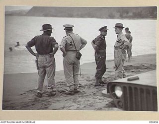 BUT-DAGUA AREA, NEW GUINEA. 1945-04-12. SENATOR J.M. FRASER, ACTING MINISTER FOR THE ARMY (4), AND LIEUTENANT GENERAL J. NORTHCOTT, CHIEF OF THE GENERAL STAFF (2), DURING THEIR VISIT TO ..