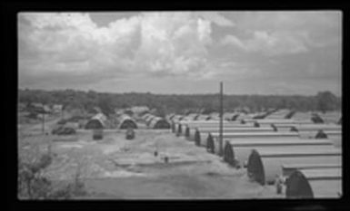 [Quonset huts at military base]