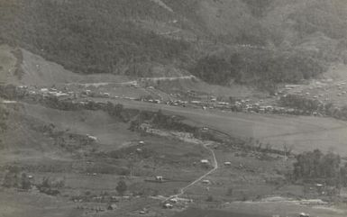 Wau, a mining town of the New Guinea goldfields, at 3800 feet above sea-level / Albert T. Simmons