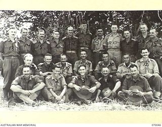 KELANOA, NEW GUINEA. 1944-01-23. SOME OF THE OFFICERS OF THE 2/15TH INFANTRY BATTALION WHO WERE IN ACTION IN THE FINSCHHAFEN AREA AND THE PURSUIT TO SIO. IDENTIFIED PERSONNEL ARE: QX17354 ..