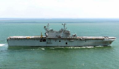 Starboard side view of the US Navy (USN) TARAWA CLASS: Amphibious Assault Ship USS SAIPAN (LHA 2) underway off the coast of Virginia Beach, Virginia (VA)
