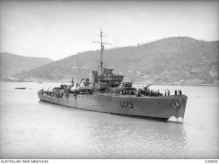 PORT MORESBY, PAPUA. 1942-09. H.M.A.S. WARREGO IN PORT MORESBY HARBOUR AFTER ESCORTING A CONVOY OF TROOPSHIPS AND SUPPLY VESSELS FROM AUSTRALIA