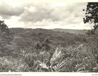 FINSCHHAFEN AREA, NEW GUINEA, 1944-03-17. THE 2,600 FEET FEATURE VIEWED FROM JIVEVENANG VILLAGE