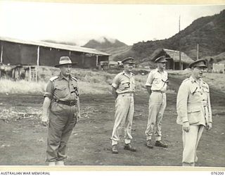 NADZAB, NEW GUINEA. 1944-09-26. VX13 LIEUTENANT-GENERAL S.G. SAVIGE, CB, CBE, DSO, MC, ED, GOC NEW GUINEA FORCE (1), ADDRESSING MEMBERS OF THE 1ST NEW GUINEA INFANTRY BATTALION AT CAMP DIDDY. ..