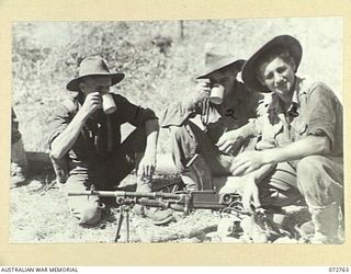 BOGADJIM, NEW GUINEA. 1944-04-26. V320442 PRIVATE L. T. TREMAYNE (1), WITH V322121 PRIVATE D. PIGRAM (2) AND V122194 PRIVATE L. A. TANIAN (3), MEMBERS OF A PATROL FROM C COMPANY 57/60TH INFANTRY ..