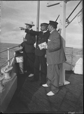 South Sea Islands Cruise - S.S. Mapourika. Capt. Crawshaw points out object of interest to C.H. Mills and Dr Mason 1903