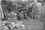 Pig festival, pig sacrifice, Tsembaga: women prepare food in ancestral shrine