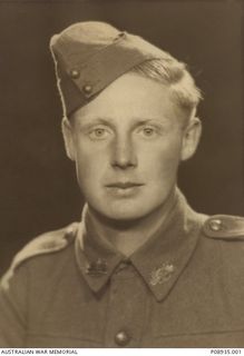 Studio portrait of VX23568 Private (Pte) John William Hayes, 2/22 Battalion, of Heidelberg, Victoria. Pte Hayes enlisted in June 1940 and served in New Britain. Following the Japanese invasion of ..