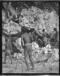 Group of men near coral