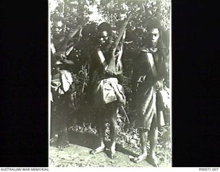 TAI TAI JUNCTION, BOUGAINVILLE ISLAND, SOLOMON ISLANDS, 1946-08. THREE POLICE BOYS