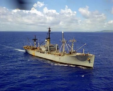 A starboard bow view of the cable transport ship USNS FURMAN (T-AK-280) underway