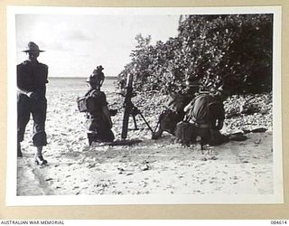 SIROT ISLAND, JOINING GREEN ISLAND, BOUGAINVILLE AREA, SOLOMON ISLANDS. 1944-12-20. D COY, 27 INFANTRY BATTALION TROOPS IN ACTION WITH A 3 INCH MORTAR ATTACKING ENEMY POSITIONS DURING AMPHIBIOUS ..