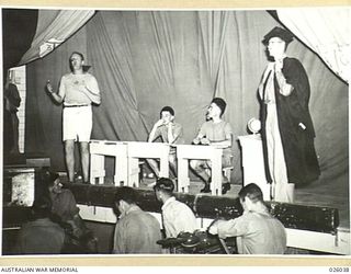PAPUA, NEW GUINEA. 1942-07. THE 4TH FORM AT ST. MORESBY'S; AS PRESENTED BY THE PORT MORESBY CONCERT PARTY, A TROUPE OF ENTERTAINERS RECRUITED FROM TROOPS OF AN AUSTRALIAN INFANTRY BRIGADE FOR THE ..