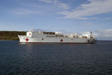 The US Navy Military Sealift Command (MSC) Mercy Class Hospital Ship (AH) USNS MERCY enters Apra Harbor, Guam, during its five-month deployment in the Pacific Region. The ship will participate in humanitarian assistance and civic action programs with civilian organizations at several Western Pacific islands. The MERCY is capable of supporting medical and humanitarian assistance needs. It is configured with special medical equipment and the ship has multi-specialized medical teams that can provide a range of services ashore as well as aboard the vessel