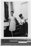 Women leaving Catholic Charities building, Honolulu, Hawaii, 1947