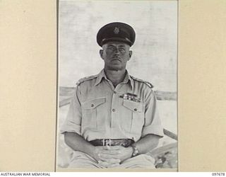 LAE, NEW GUINEA. 1945-10-05. BRIGADIER G.B.G. MAITLAND, DIRECTOR OF MEDICAL SERVICES, HEADQUARTERS FIRST ARMY