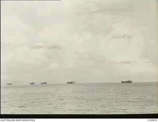 LOS NEGROS ISLAND, ADMIRALTY ISLANDS. 1944-03-18. ARRIVAL OF CONVOY OF LANDING BARGES CARRYING RAAF REINFORCEMENTS AND AMERICAN TROOPS