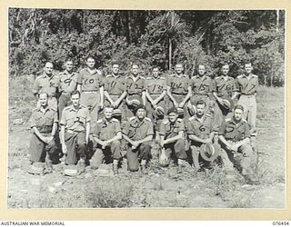 LAE, NEW GUINEA. 1944-10-07. OFFICERS OF THE 2/8TH COMMANDO SQUADRON. IDENTIFIED PERSONNEL ARE:- VX94861 CHAPLAIN H.W. NUNN (1); VX91862 CAPTAIN B. CLEREHAN (2); NX68278 LIEUTENANT A.C. JONES (3) ..