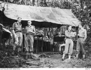 SALAMAUA AREA, NEW GUINEA. 1943-07-22. OPERATING THEATRE OF THE 2/2ND AUSTRALIAN FIELD AMBULANCE. LEFT TO RIGHT: NX114064 CAPTAIN OWEN U. WILLIAMS, 2/2ND AUSTRALIAN FIELD AMBULANCE; NX12278 CAPTAIN ..