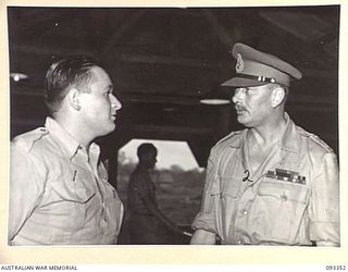 LAE AREA, NEW GUINEA, 1945-06-30. DURING HIS TOUR OF INSPECTION OF AUSTRALIAN TROOPS IN THE LAE AREA, HIS ROYAL HIGHNESS, THE DUKE OF GLOUCESTER, GOVERNOR-GENERAL OF AUSTRALIA (2) VISITED THE ..