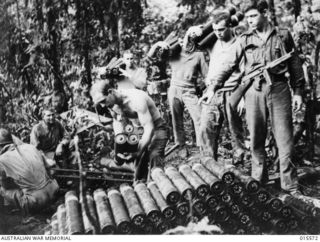 Mount Tambu, New Guinea. 1943-08. Australian soldiers building an ammunition dump on Mount Tambu to enable Japanese positions on the Mount and the Komiatum Track to be put under fire