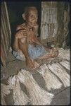 Weaving: Bomtavau prepares banana leaf fibers for making a fiber skirt