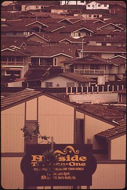 PEARL CITY, ON THE WEST SIDE OF HONOLULU, IS THE FASTEST GROWING AREA IN ALL OF HAWAII. THE STATE ADMINISTRATION WOULD LIKE OAHU RESIDENTS TO CONSIDER MOVING TO THE NEIGHBORING ISLANDS, BUT MEANWHILE THE LAND USE COMMISSION REZONED THIS LAND, ADJOINING AN OLDER DEVELOPMENT, AS APPROPRIATE FOR URBAN DESIGNATION