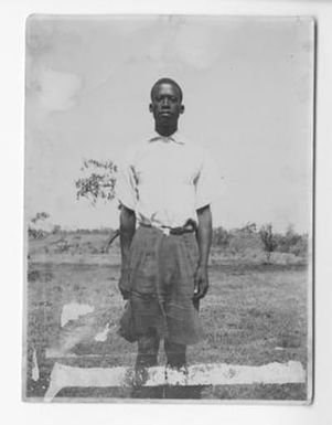 [Photo of Calvin Muatshimbua]