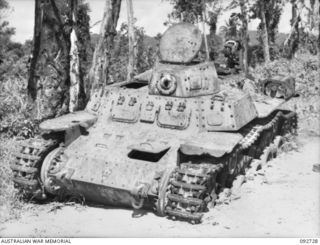 WEWAK AREA, NEW GUINEA, 1945-05-28. A KNOCKED OUT JAPANESE TYPE 97 CHI-HA ENGINEER RECOVERY TANK WHICH WAS FOUND NEAR BORAM IN THE HQ 6 DIVISION AREA