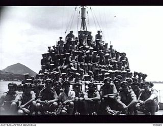 RABAUL, NEW BRITAIN, 1946-03-07. MEMBERS OF THE COMPANY OF HMAS BARCOO (K375) ON THE FORE DECK