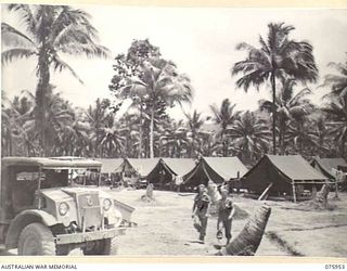 NAGADA, NEW GUINEA. 1944-09-11. A SECTION OF THE 5TH FIELD COMPANY, CAMP AREA. IDENTIFIED PERSONNEL ARE: NX124392 SAPPER R.J. SPICER (1); NX124386 SAPPER G.C. CAMPBELL (2)