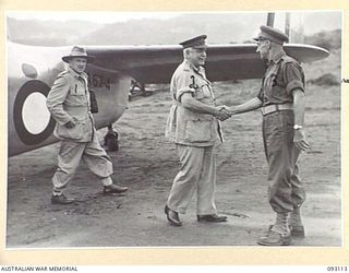 WEWAK AREA, NEW GUINEA, 1945-06-14. GENERAL SIR THOMAS A. BLAMEY, COMMANDER-IN-CHIEF, ALLIED LAND FORCES, SOUTH WEST PACIFIC AREA (2) SHAKING HANDS WITH MAJ-GEN J.E.S. STEVENS, GOC 6 DIVISION (3), ..