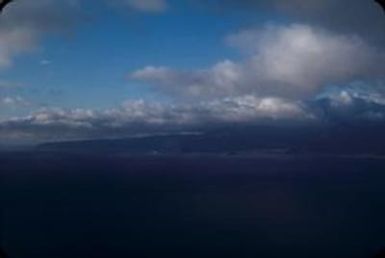 [Aerial view of mountains and coastline of Oahu Island, United States]