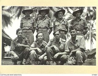 MILILAT, NEW GUINEA. 1944-07-22. NON COMMISSIONED OFFICERS OF HEADQUARTERS, ROYAL AUSTRALIAN ARTILLERY, 5TH DIVISION. IDENTIFIED PERSONNEL ARE:- QX28080 SERGEANT R.H. GARLAND (1); QX30698 SERGEANT ..