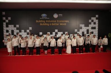 Barack Obama joins Asia Pacific Economic Cooperation Summit leaders and spouses for a group photo in Pasay, Metro Manila, Philippines, November 18, 2015