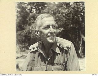 WASU, PAPUA, 1944-03-25. V148300 CAPTAIN MARK PITT DCM, A DISTRICT OFFICER OF THE AUSTRALIAN NEW GUINEA ADMINISTRATIVE UNIT STATIONED AT FINSCHHAFEN, HAS BEEN IN THE TERRITORY OF NEW GUINEA FOR ..