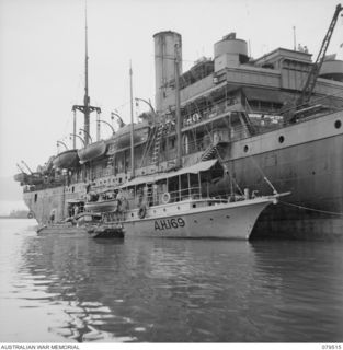 LAE, NEW GUINEA. 1943-11. THE AUSTRALIAN HOSPITAL SHIP, SS "STRADBROKE II" WITH THE AH169, SS "BONTILO" ANCHORED ALONGSIDE