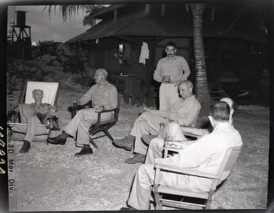 Photograph of Ernie Pyle with Officers in Guam