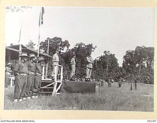 TOROKINA, BOUGAINVILLE. 1945-05-18. LIEUTENANT GENERAL S.G. SAVIGE, GENERAL OFFICER COMMANDING 2 CORPS (6), ADDRESSING PARADE OF 7 INFANTRY BRIGADE TROOPS AT GLOUCESTER PARK. IDENTIFIED PERSONNEL ..
