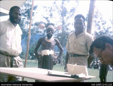 Unidentified men at the election