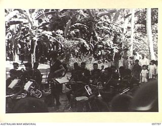 RATONGOR, NEW BRITAIN. 1945-10-10. THE ROYAL PAPUAN CONSTABULARY BAND WHO ARRIVED IN 3-TON TRUCKS FROM RABAUL TO TAKE PART IN THE GALA DAY HELD AT THE CHINESE CIVILIAN CAMP ON THE 34TH ANNIVERSARY ..